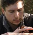 Jeremy Wilson inspecting a trapdoor spider.