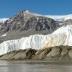 This blood-red stain at the snout of Taylor Glacier in Antarctica is the by-product of unique microbes thriving in a salty ocean-like reservoir beneath the glacier.