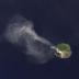 An ash plume drifts from Paluweh volcano in Indonesia in this image, taken April 29, 2013, from the Landsat Data Continuity Mission's Operational Land Imager instrument.