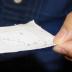 Water droplets are vigorously repelled by the fabric -- unless they are taken up by hydrophilic threads.