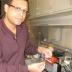 Dr. Alamgir Karim, associate dean of research for the University of Akron College of Polymer Science and Polymer Engineering and Goodyear Chair Professor of Polymer Engineering,holds a strip of the polymer thin film that can now be produced at an industrial level for use in a wide range of applications.