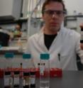 Researcher Julius Lipp, Ph.D., of Bremen University, Germany, with some of his samples.