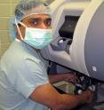 Pediatric surgeon Mohan Gundeti, MD, at the Da Vinci console.