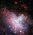 This three-color composite mosaic image of the Eagle Nebula (Messier 16) is based on images obtained with the Wide-Field Imager camera on the MPG/ESO 2.2m telescope at the La Silla Observatory. At the center, the so-called "Pillars of Creation" can be seen. This wide-field infrared image shows not only the central pillars, but also several others in the same star-forming region, as well as a huge number of stars in front of, in, or behind the Eagle Nebula. The cluster of bright stars to the upper right is NGC 6611, home to the massive and hot stars that illuminate the pillars. The "Spire" -- another large pillar -- is in the middle left of the image.