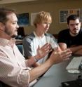 Wake Forest University computer science professor Errin Fulp works with graduate students Brian Williams (center) and Wes Featherstun (far right), who worked this summer at Pacific Northwest National Laboratory developing a new type of computer network security software modeled after ants.