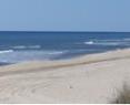These are two rip currents along the East Hampton Village Beach about 100 yards apart. Rip currents can be recognized as a gap in the line of incoming waves.