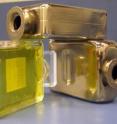 Metallic glasses discovered in the 1990s behave similary to silicate glasses (window glass), as these blown metallic-glass bottles illustrate. The trick is to add atoms of various sizes to the melt that get in the way of the atoms arranging themselves in crystalline lattices. Metallic glasses discovered in the 1990s behave similary to silicate glasses (window glass), as these blown metallic-glass bottles illustrate. The trick is to add atoms of various sizes to the melt that get in the way of the atoms arranging themselves in crystalline lattices.