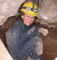 This is Elizabeth Hadly excavating material from Samwell Cave in northern California.