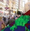 NeuFlow is a supercomputer that mimics human vision to analyze complex environments, such as this street scene.
