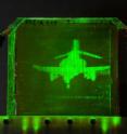 This is a refreshable, holographic image of an F-4 Phantom Jet created on a photorefractive polymer at the College of Optical Sciences, the University of Arizona. This is a refreshable, holographic image of an F-4 Phantom Jet created on a photorefractive polymer at the College of Optical Sciences, the University of Arizona.