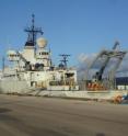 This is the <I>Thomas G. Thompson</I> and the <I>Marcus G. Langseth</I> at the Navy Pier in Guam. The <I>Thompson</I> laid seismic instruments, which are stacked and ready on its deck, and the <I>Langseth</I> then sailed transects over the instrumented area, firing its airgun array and recording the reflections from subsurface rock layers.