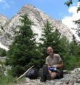 This image shows Professor Jens-Christian Svenning, Aarhus University, in Grand Teton National Park, Wyoming, USA. Behind Svenning can be seen Engelmann spruce, which is one of the species that have been planted successfully in Greenland, and which according to the researchers' models will be able to thrive in large parts of southern Greenland in a future warmer climate.
