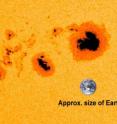 One of the largest sunspots in the last nine years, labeled AR1944, was seen in early January 2014, as captured by NASA's Solar Dynamics Observatory. An image of Earth has been added for scale.