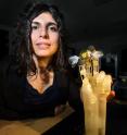 Artificial hand able to respond sensitively thanks to muscles made from smart metal wires: Engineers at Saarland University have taken a leaf out of nature's book by equipping an artificial hand with muscles made from shape-memory wire. The new technology enables the fabrication of flexible and lightweight robot hands for industrial applications and novel prosthetic devices. The muscle fibres are composed of bundles of ultrafine nickel-titanium alloy wires that are able to tense and flex. The material itself has sensory properties allowing the artificial hand to perform extremely precise movements. The research group led by Professor Stefan Seelecke will be showcasing their prototype artificial hand and how it makes use of shape-memory 'metal muscles' at HANNOVER MESSE - the world's largest industrial fair - from April 13th to April 17th. The team, who will be exhibiting at the Saarland Research and Innovation Stand in Hall 2, Stand B 46, are looking for development partners. Filomena Simone (Photo), an engineer in the research team led by Stefan Seelecke, is working on the prototype of the artificial hand.