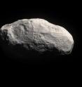 Artist's impression of the unique object C/2014 S3 (PANSTARRS). Observations with ESO's Very Large Telescope, and the Canada France Hawai`i Telescope, show that this is the first object to be discovered that is on a long-period cometary orbit, but that has the characteristics of a pristine inner Solar System asteroid. It may provide important clues about how the Solar System formed.

Because the object has spent most of its life away from the inner Solar System it suffered very few collisions, and its surface displays few or no craters. As it formed in the same region as the Earth did, it is mostly rocky, and therefore has only very limited cometary activity.