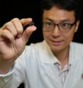 Associate Professor Yang Hyunsoo from the National University of Singapore, who led a research team to successfully embed a powerful magnetic memory chip on a plastic material, demonstrating the flexibility of the memory chip.